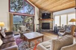 Mammoth Condo Rental Meadow Ridge 24: Spacious living room with spectacular views and a gas fireplace